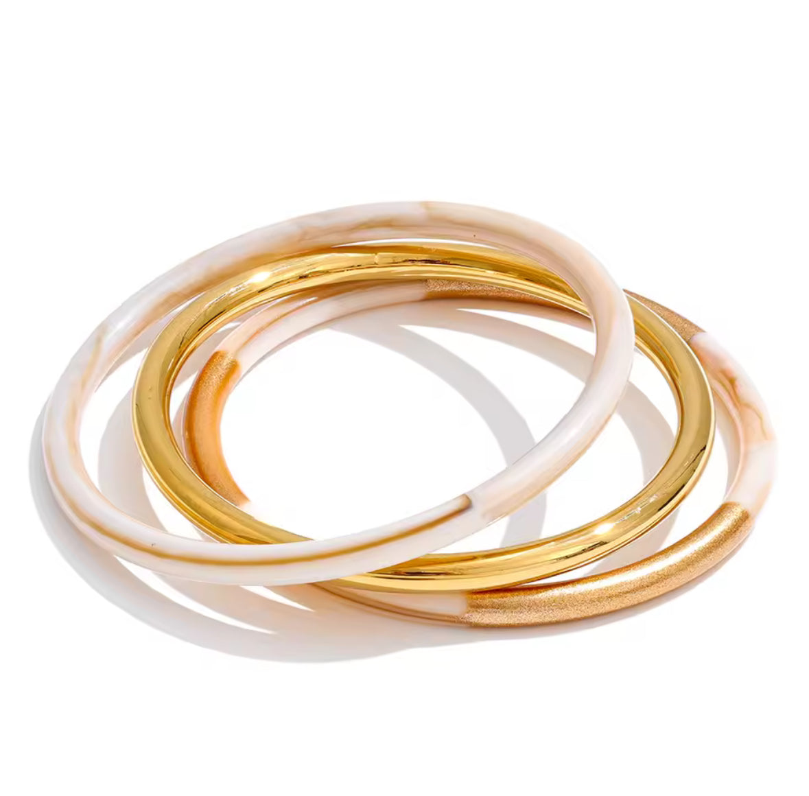 White and Gold Bracelets